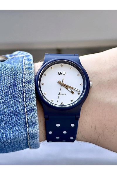 Q&Q Unisex Waterproof Plastic Cord Wrist Watch