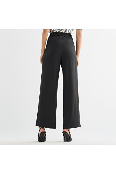 FAV PANTS WITH METALLIC CHAIN