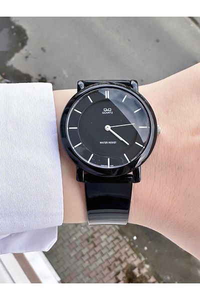 Q&Q Women's Waterproof Plastic Cord Wristwatch