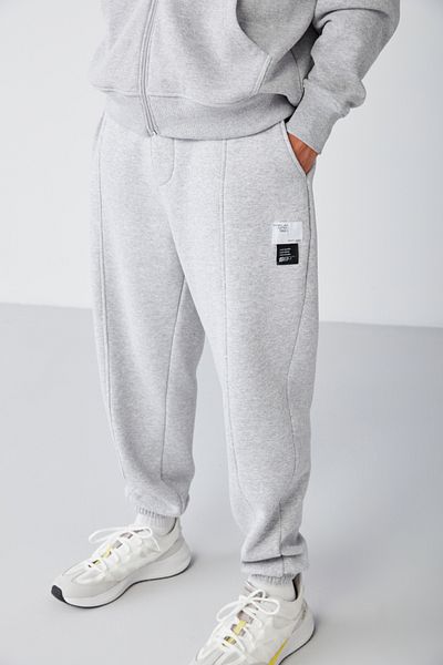 GRIMELANGE Ανδρικό παντελόνι φούτερ Rowan Relaxed Raised με ραβδώσεις στο μπροστινό μέρος και διακοσμητική ετικέτα Grimelange