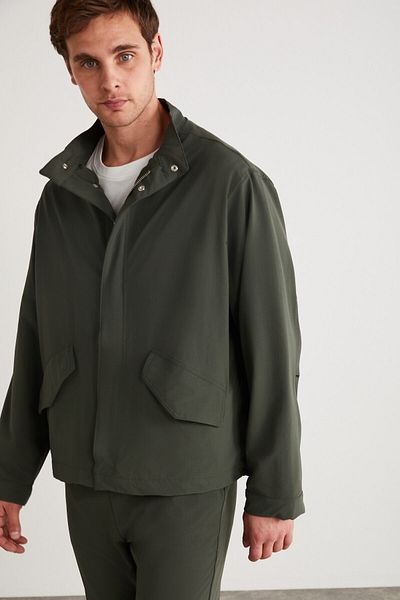 GRIMELANGE Roger Herren-Jacke aus dehnbarem technischen Stoff, dick, mit Reißverschluss gefüttert, grün, mit Ärmelbündchen und Pattentaschen