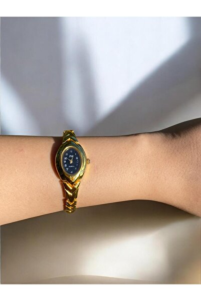 Vola Collection ساعة يد نسائية بسوار معدني رفيع وغطاء معدني ذهبي 3