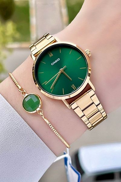 Casio Women's Wristwatch with Green Cord and Gold Color