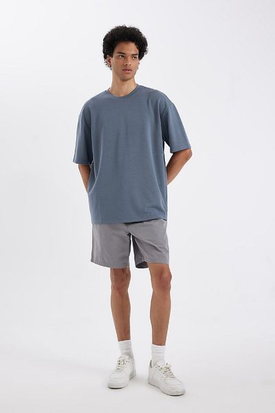 DeFacto Oversize Wide Fit tričko s krátkým rukávem a krátkým rukávem ze základní hladké tkaniny 3159396