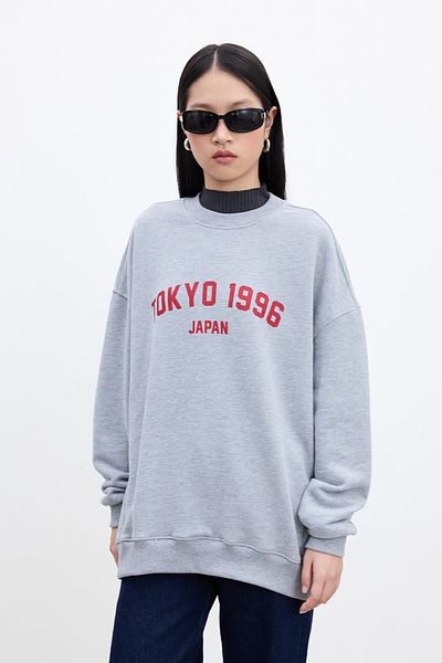 Manuka Graues, übergroßes Sweatshirt in Melange-Optik – mit Druckdetail