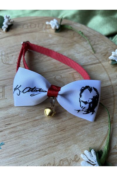 Melo Ataturk silhouette and autographed cat collar