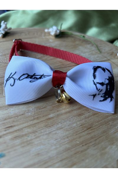 Melo Ataturk silhouette and autographed cat collar