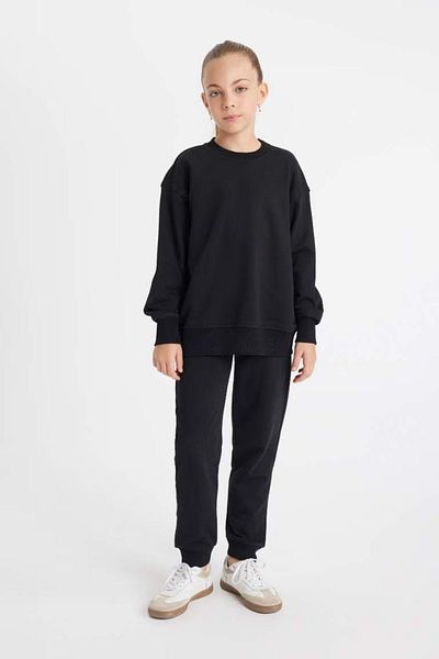 DeFacto Schwarze Standard-Fit-Schul-Jogger-Jogginghose für Mädchen mit elastischen Bündchen an der Taille 25k801t01273