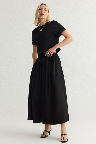 Trendyol Collection Fusta neagră evazată Maxi țesută cu talie elastică TWOSS25ET00017
