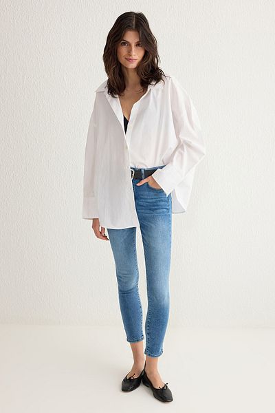 Trendyol Collection Blaue Skinny-Jeans mit hoher Taille TWOSS25JE00113