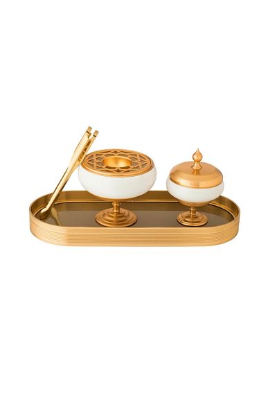 Dania A set of incense burner and oud boxes, white porcelain and gold metal, with a clamp and tongs