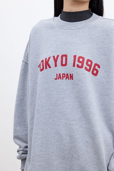 Manuka Graues, übergroßes Sweatshirt in Melange-Optik – mit Druckdetail