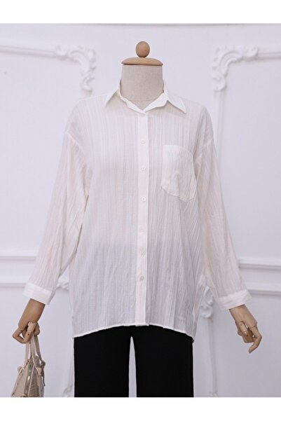 Modamorfo Egy zsebes gombos ráncos tunika