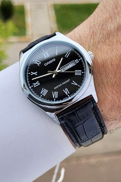 Casio ساعة يد رجالية باللون الأسود مع سلك فضي