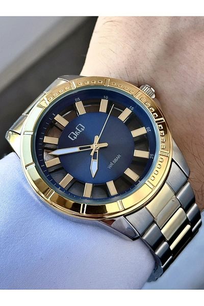 Q&Q Men's Metal Silver Gold Glass Cover Transparent Modern Dial Style Analog Watch