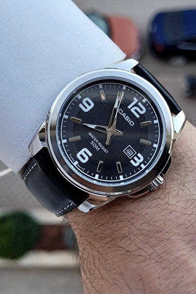 Casio Kasası Gümüş Kordonu Siyah Renk 5 ATM Erkek Kol Saati