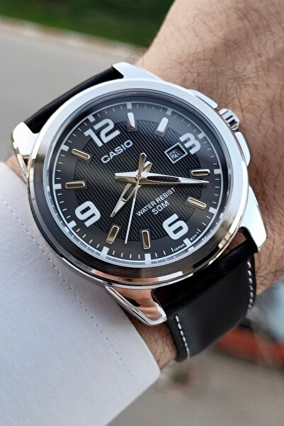 Casio Kasası Gümüş Kordonu Siyah Renk 5 ATM Erkek Kol Saati