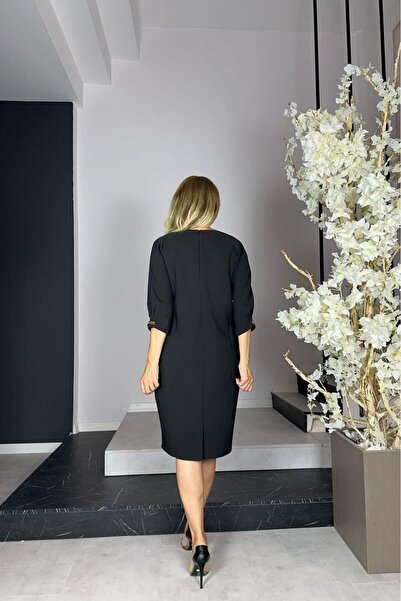 gesmoda Μαύρο φόρεμα G1115 με λεπτομέρεια γιακά και μανίκια