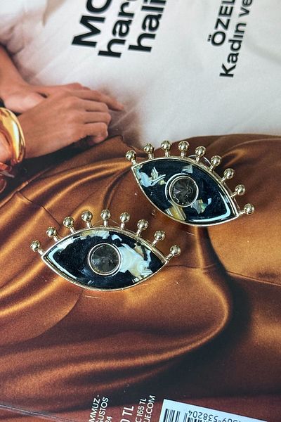 Trendy Butik أقراط العين من الفولاذ باللون الأسود