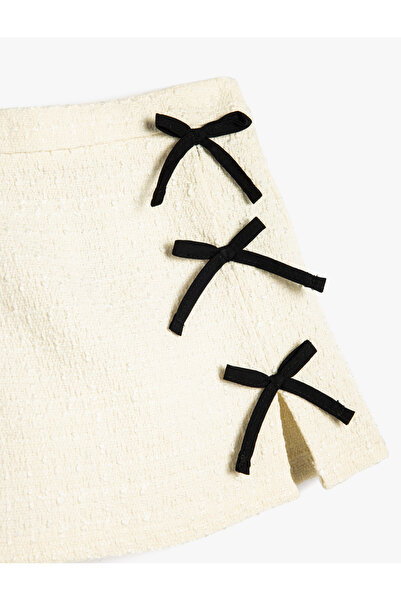 Koton A-vonalú szoknya masnival, gyapjúkeverékkel és hasított részlettel