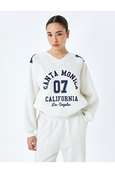 Koton Світшот з принтом коледжу з довгими рукавами та великим V-подібним вирізом