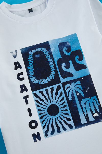 TRENDYOLKIDS Ecru potištěné pletené tričko Tkdss25Ts00058