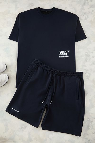 Trendyol Collection Marineblaues Oversize-T-Shirt mit Rundhalsausschnitt und Shorts – Trainingsanzug-Set in Übergröße