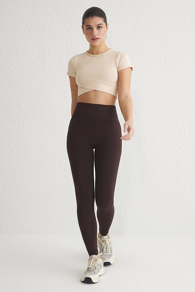 Trendyol Collection Braune, nahtlose Sport-Leggings in voller Länge THMAW25TY00003