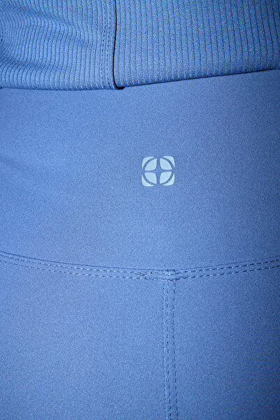 Trendyol Collection Colanți sport tricotați de lungime întreagă, cu imprimeu reflector din țesătură periată moale Indigo THMAW25TY00020