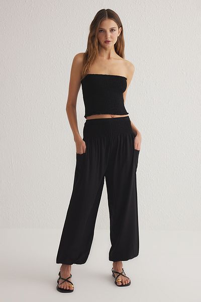 Trendyol Collection Schwarze Baggyform-Webhose mit elastischen Beinen TWOSS25PL00063