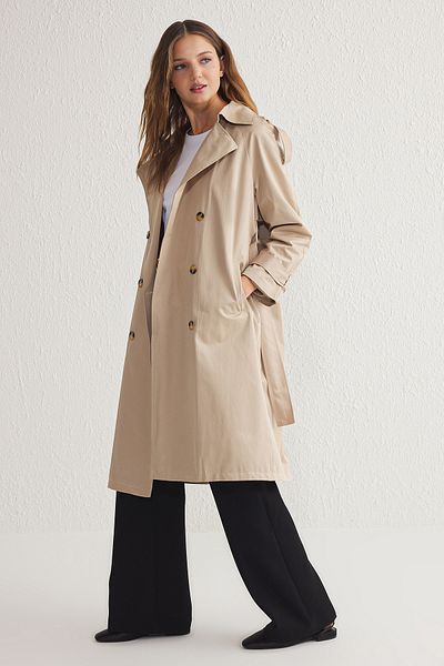 Trendyol Collection Beiger wasserabweisender Trenchcoat mit Gürtel - TWOSS20TR0012
