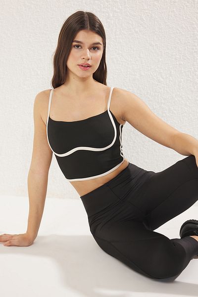 Trendyol Collection Black and White Piping Detailed Backing/Shaping Knitted Sports Bra Thmss25Ss00008