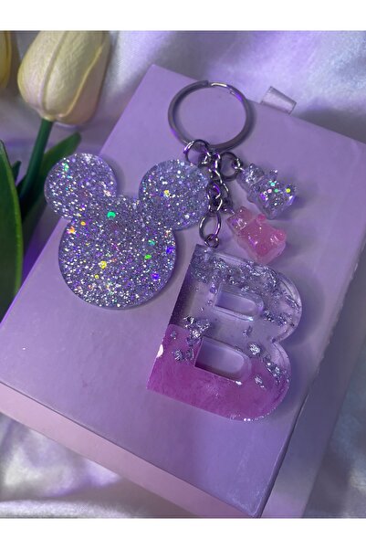 TATLIŞ El yapımı epoksi gümüş pembe tonlarında Mickey detaylı harf anahtarlık...