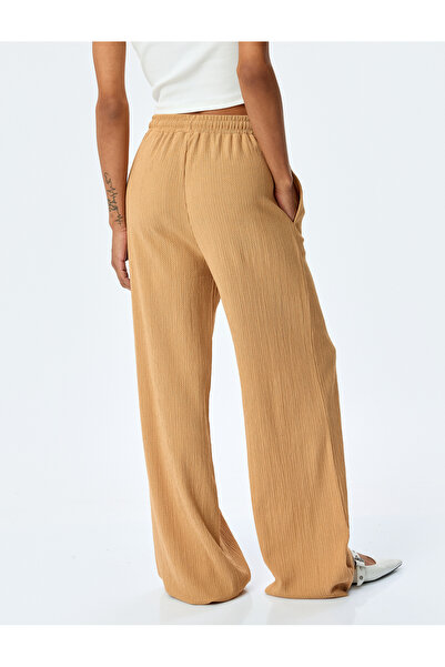 Koton Beli Bağcıklı Dokulu Yüksek Bel Geniş Paça Pantolon