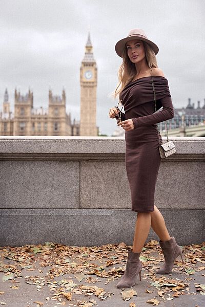 Made of Emotion Ribbed midi dress with an asymmetrical neckline