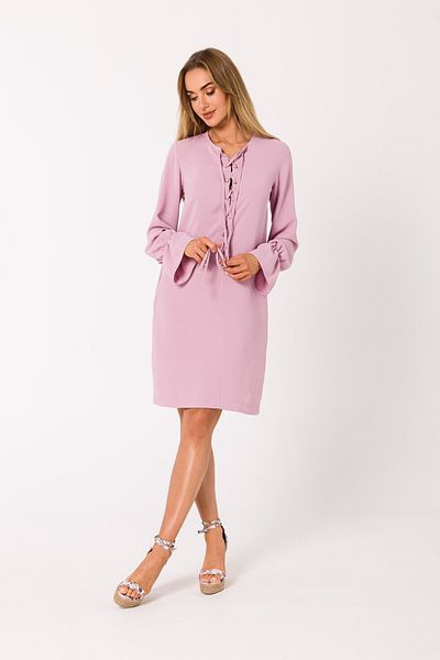 Made of Emotion This mini dress is pierced with a plunging lace-up neckline.