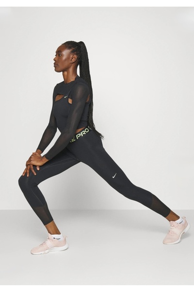 Nike Професійні тренувальні штани середньої висоти повної довжини Siyah Kadın...