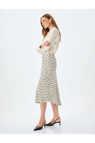 Koton Polka dot patterned midi length flared viscose skirt.