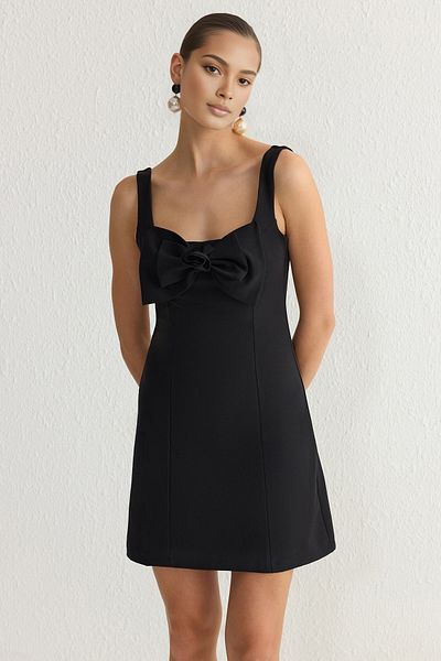 Trendyol Collection Μαύρο κομψό φόρεμα με φιόγκο με λεπτομέρεια υφαντό TPRSS25EL00092