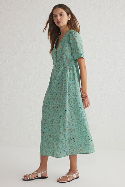 Trendyol Collection Πράσινο φλοράλ φόρεμα σε γραμμή Α Gipeli Midi υφαντό TWOSS25EL00115