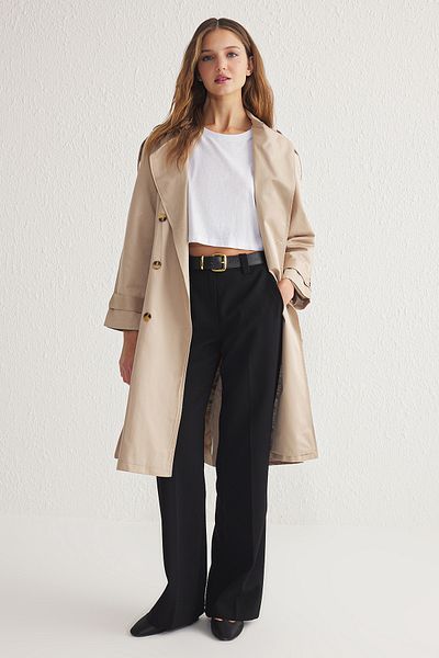 Trendyol Collection Beiger wasserabweisender Trenchcoat mit Gürtel - TWOSS20TR0012