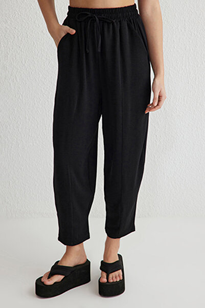 Trendyol Collection Černý elastický pas Harem/Shalwar uvolněné kalhoty Twoss25Pl00027