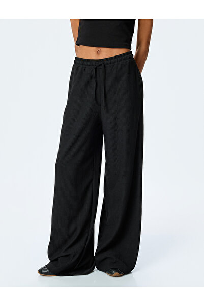 Koton Beli Bağcıklı Dokulu Yüksek Bel Geniş Paça Pantolon