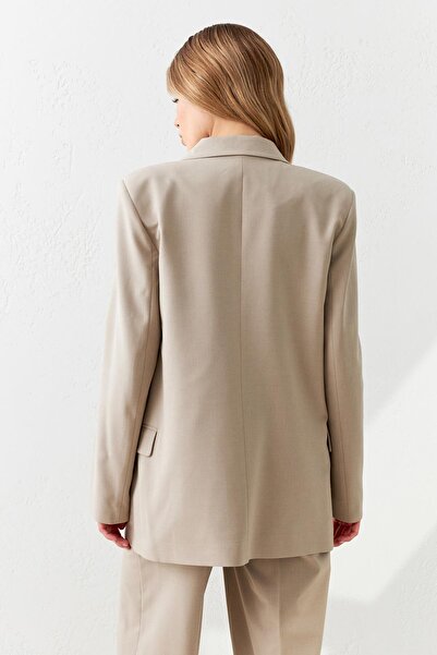 Setre Μπεζ ασύμμετρο μακρύ μπουφάν με λεπτομέρεια με κουμπιά