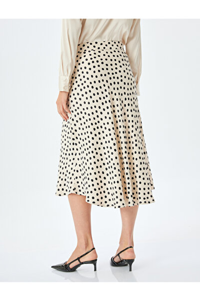 Koton Polka dot patterned midi length flared viscose skirt.