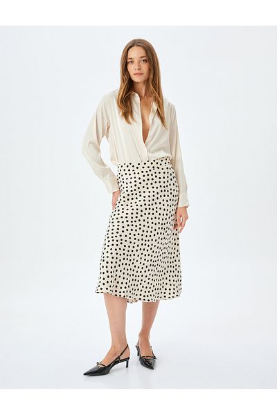 Koton Polka dot patterned midi length flared viscose skirt.