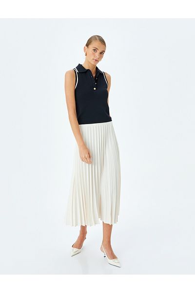 Koton Crepe fabric medium rise midi pleated skirt.