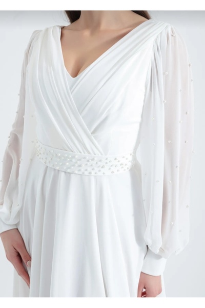 GÜZELLER Φόρεμα γάμου και βραδινό φόρεμα με μακρύ μανίκι, με πέρλες στη μέση και στα μανίκια, με λαιμόκοψη κραβουζέ