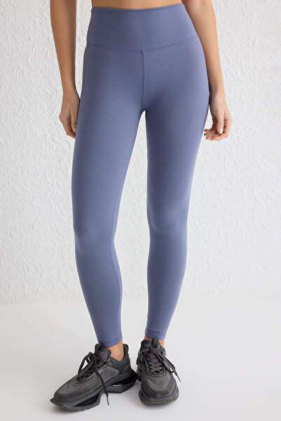 Trendyol Collection Colanți sport tricotați de lungime întreagă, cu imprimeu reflector din țesătură periată moale Indigo THMAW25TY00020