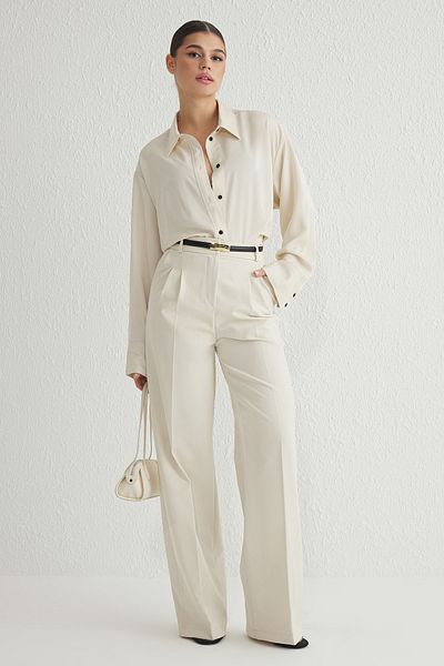 Trendyol Collection Ecru Plissee-Hose mit weitem Bein, gewebt